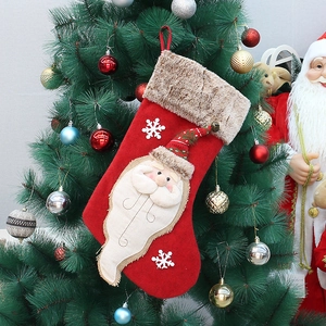 Detail of 19.7in vintage Christmas stocking with Santa 3D design and plush cuff