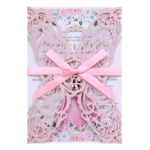 Pink laser cut butterfly invitation with a glitter finish and matching silk ribbon bow
