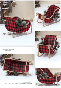 Detail of buffalo plaid Christmas sleigh decor with pine cones and rustic rope trim