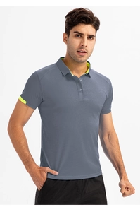Close-up of men's grey polo shirt with breathable mesh fabric and neon yellow trim