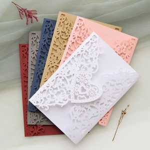 Laser-cut wedding invitation covers in six colors with elegant heart floral patterns