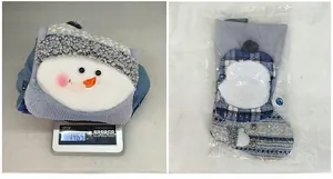 Weight measurement and OPP bag packaging for blue knitted snowman Christmas stocking