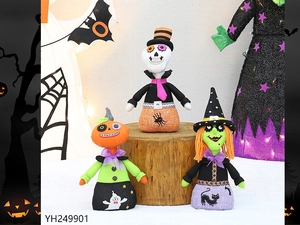 Detailed view of Halloween plush trio featuring skeleton, pumpkin, and witch on wood stumps