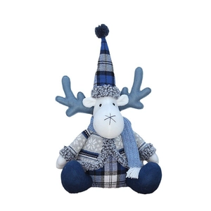 Christmas plush reindeer figurine in blue knit hat and grey snowflake sweater