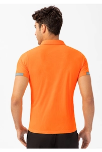 Detail of breathable orange polo shirt mesh fabric and grey sleeve patch for men