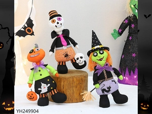Detail of Halloween fabric plush dolls featuring pumpkin head, skeleton and witch figures