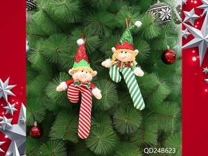 Detail of red and green striped Christmas elf plush ornaments hanging on a festive tree branch