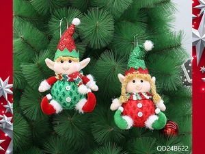 Close-up of plush Christmas elf ornaments with sequins and knit details on a tree