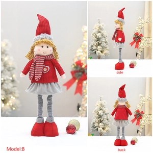 Three-sided view of a 59cm retractable Christmas girl doll in red knitted sweater and hat