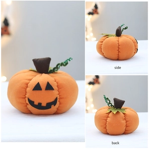 Three-view detail of plush Halloween pumpkin with spooky face, side and back perspectives