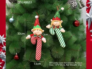 Pair of Christmas elf candy cane plush pendants hanging on a decorated tree
