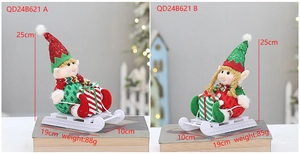 Duo von Weihnachts-Elfenpuppen auf Schlitten mit Größenangaben und Gewichtsdetails