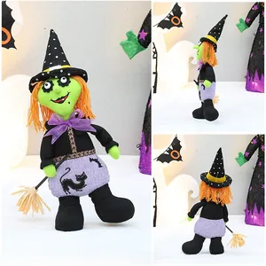 Detail view showing front, side and back of a colorful Halloween witch doll with orange hair