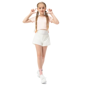 Girls activewear set with pink crop top and white high-waisted shorts on white background
