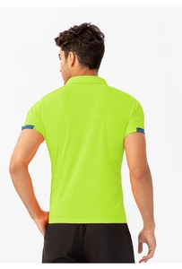 Detail view of the breathable honeycomb mesh fabric on fluorescent green sports Polo shirt