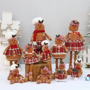 Detailed collection of plush gingerbread dolls in festive outfits for Christmas decor