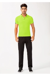 Close-up of neon green men's sports polo shirt with blue contrast trim and three buttons