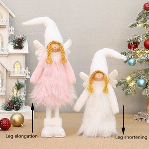 Detail showing the adjustable telescopic legs feature on pink and white plush angel dolls