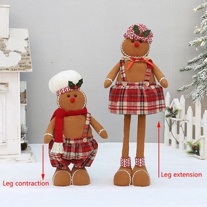 Detail showing adjustable telescopic legs on gingerbread man Christmas plush figurines