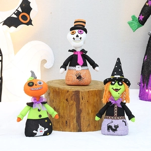 Handcrafted Halloween fabric dolls set including skeleton, pumpkin head, and witch figurines