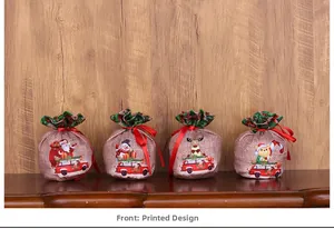 Set of four burlap Christmas drawstring gift bags with Santa, snowman, and reindeer prints