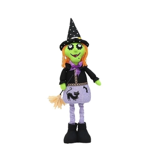 Halloween witch doll with orange hair, pointed hat, and broom for festive decoration