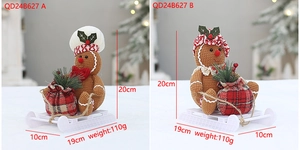 Detail of Christmas gingerbread plush figures with hats and sled bases for holiday decor