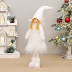 Detail of plush Christmas angel with golden curls, white fur hat, and retractable legs