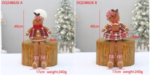Detail of 40cm knitted gingerbread man figurines with chef hats and festive Christmas outfits