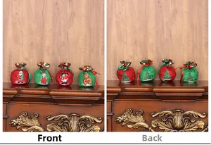 Front and back views of four festive Christmas drawstring gift bags on a wooden mantel