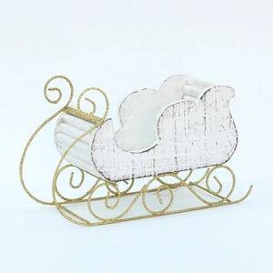 Vintage white wooden Christmas sleigh ornament with gold glitter scroll iron base