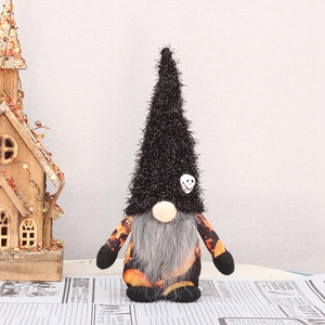 Close-up of Halloween gnome with Jack Skellington icon and orange flame pattern outfit