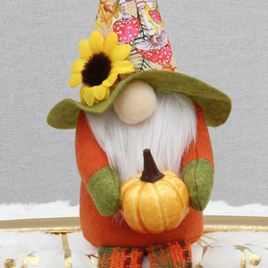 Fall harvest gnome plush decoration featuring sunflower hat and yellow pumpkin