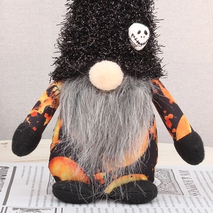 Close-up of a 32cm Halloween gnome doll featuring a skull patch and pumpkin patterns