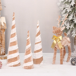 Christmas velvet reindeer and spiral cone trees decor set with golden bow on snow base