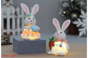 Close-up of lighted Easter bunny plush set with colorful eggs and carrot decorations