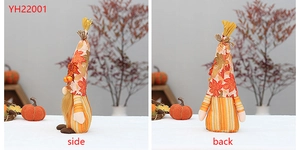 Side and back view of autumn gnome plush with sunflower maple leaf patterns for fall decor