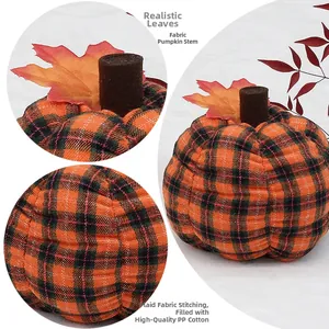 Detail view of plaid fabric pumpkin with maple leaf and felt stem for harvest decor