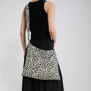 Stylish large canvas tote bag with leopard print and matching crossbody strap for women