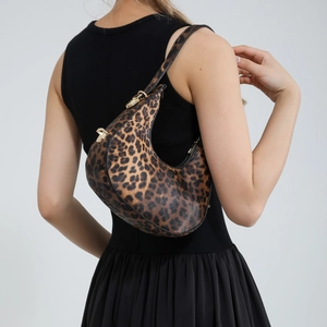 Leopard print crescent hobo bag for women with gold hardware and stylish animal pattern