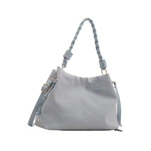 Sac seau bleu clair chic avec poignée tressée et bandoulière réglable pour femmes