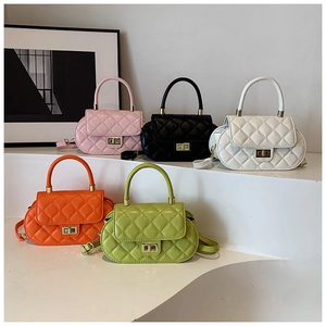Quilted mini handbags collection with golden locks and colorful leather finishes