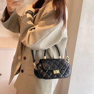 Classic black quilted crossbody bag with gold lock and stylish chain strap for women