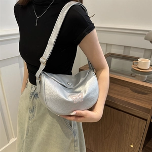 Silver crescent dumpling bag with pink butterfly embroidery and adjustable strap