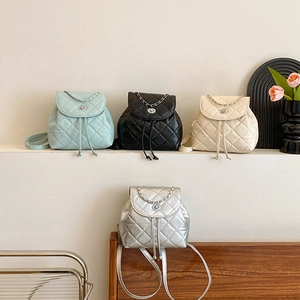 Quilted chain backpacks for women in four stylish colors with metallic turn-lock closure