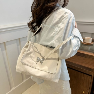 Elegant white PU leather messenger bag with silver butterfly buckle and chain strap