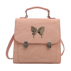 Pink pleated PU leather handbag with silver butterfly metal ornament and dual lock buckles