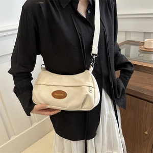 Fashionable large capacity cream canvas crossbody bag with brown leather fashion patch