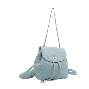 Light blue quilted leather backpack with diamond pattern and metal chain straps