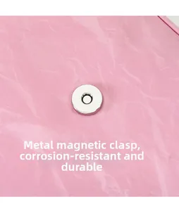 Close-up of durable silver magnetic snap on pink crinkled leather shoulder bag